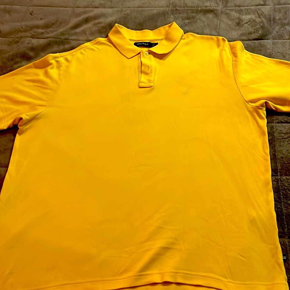 I’m selling a large Nautica shirt polo yellow